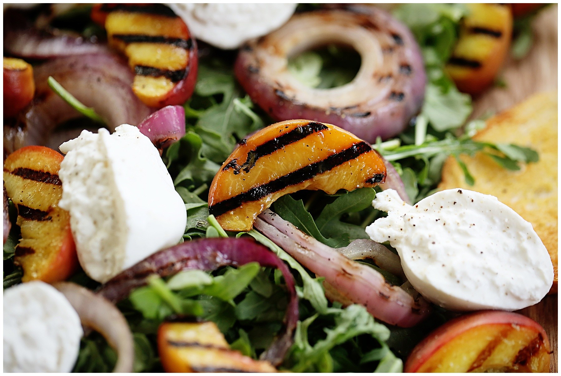 Peach and Arugula Salad with burrata and grilled onions