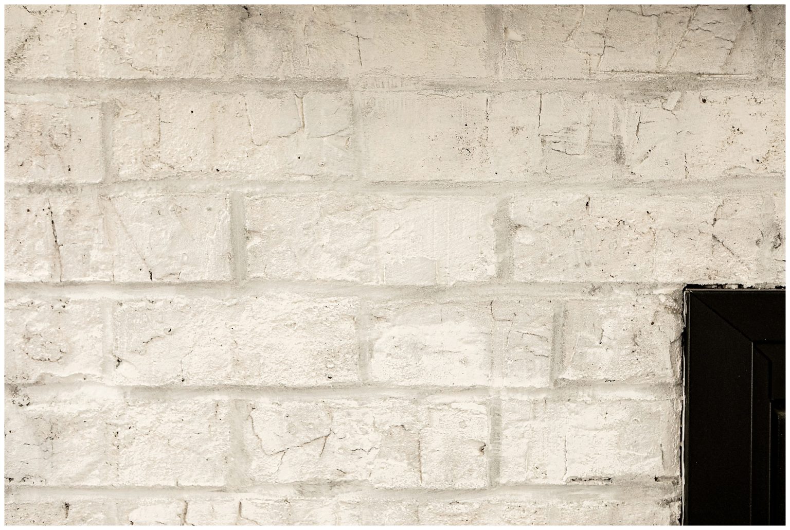 Limewashing brick fireplace with Romabio Limewash