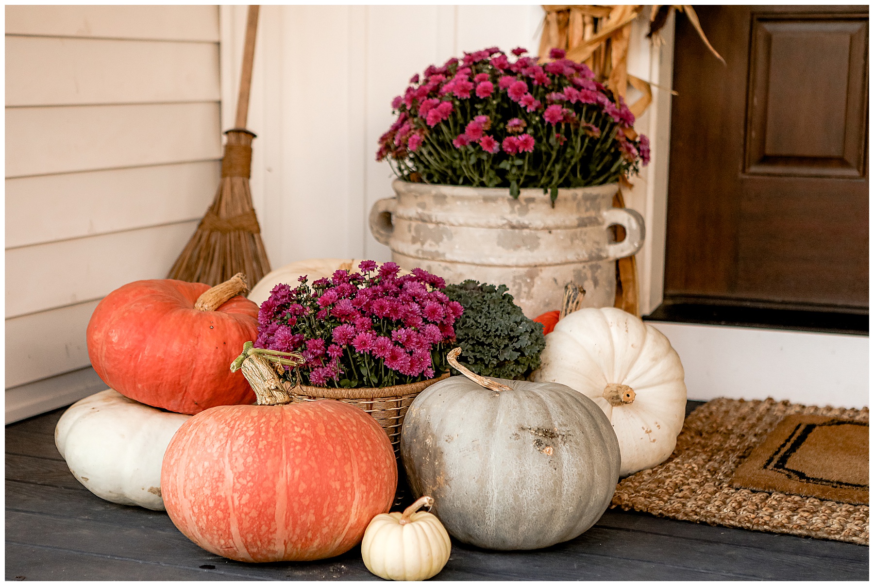 Pumpkins and flowers on porch