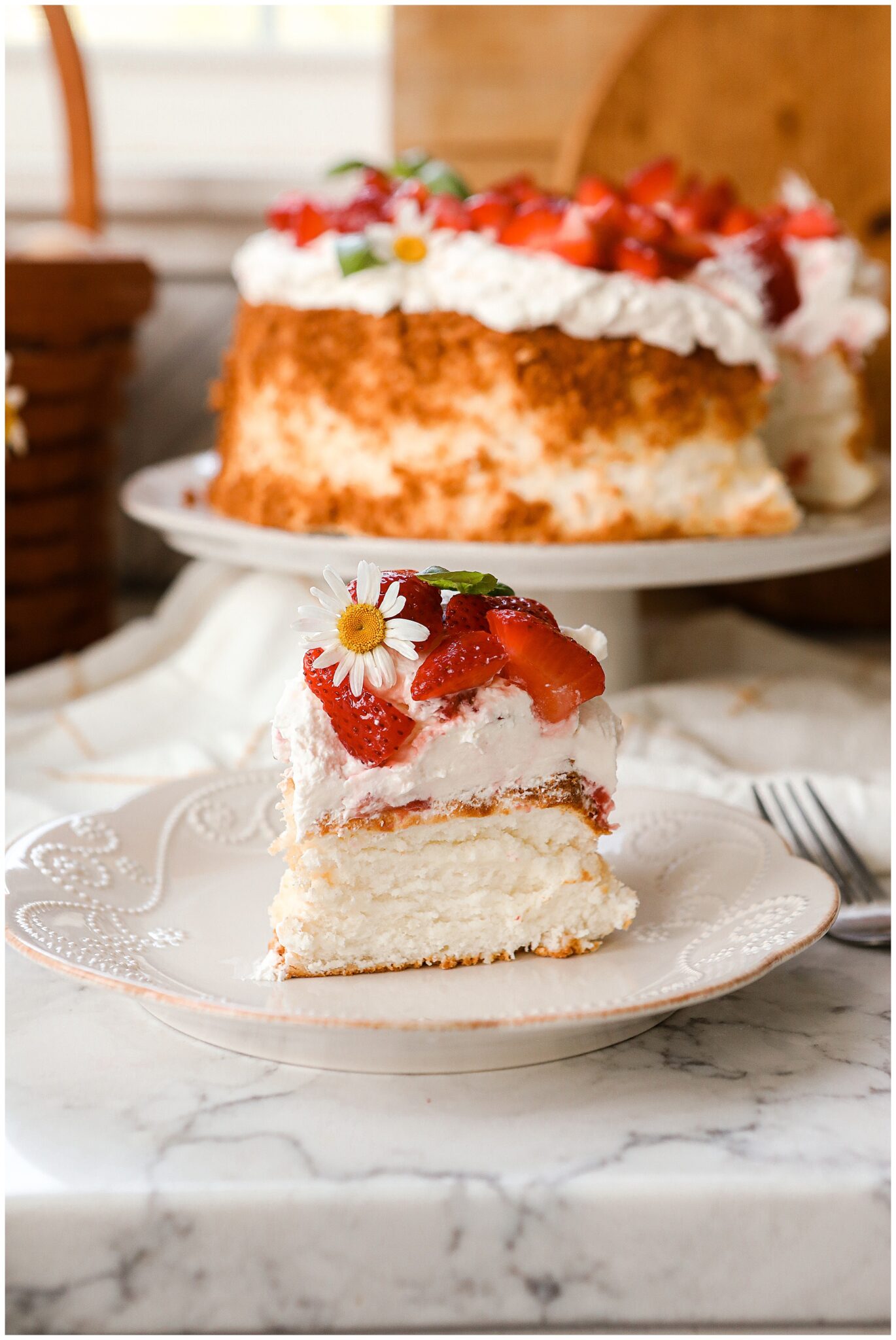 Homemade Angel Food Cake with whipped cream & strawberries