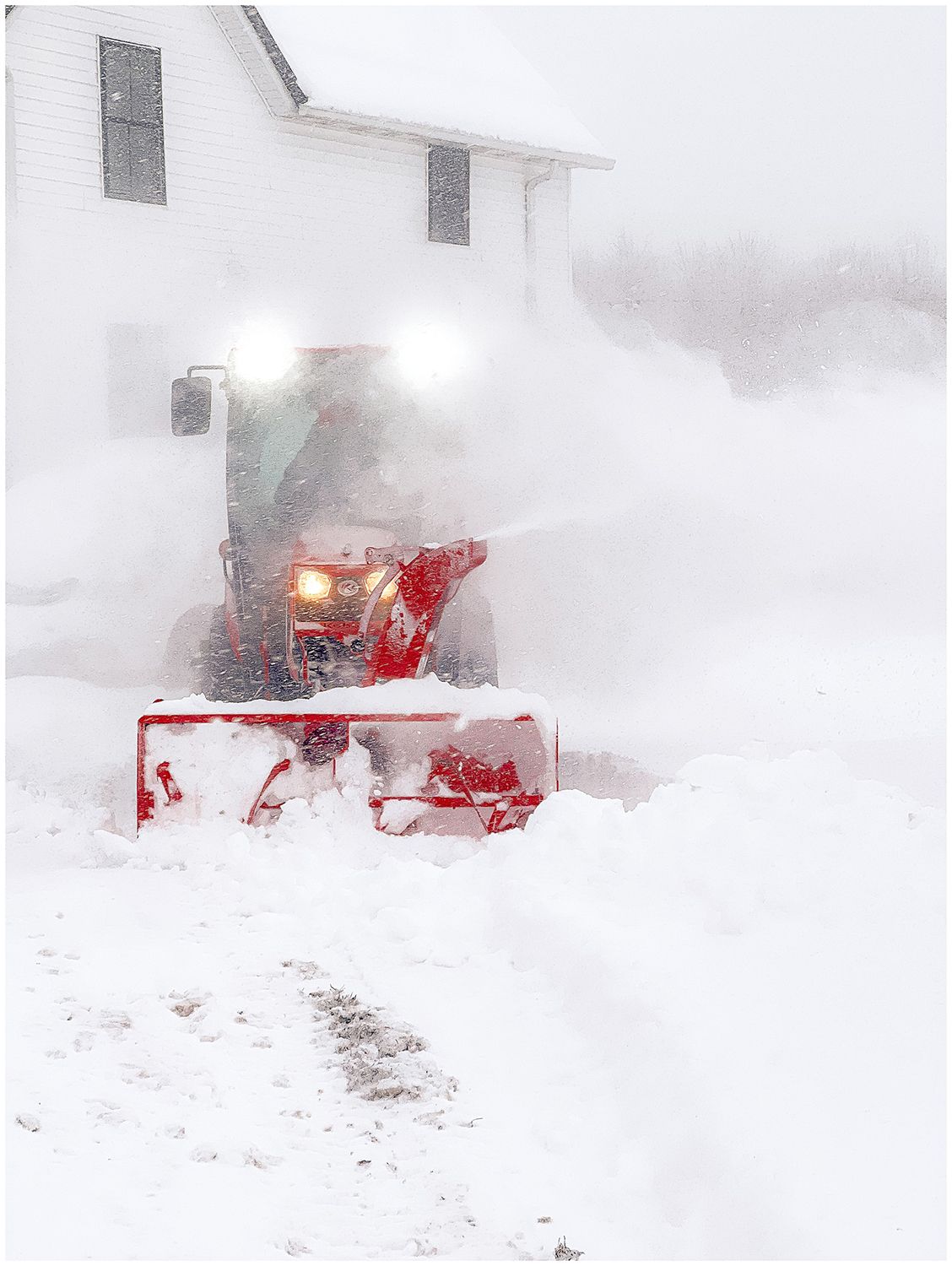 Snow blowing tractor