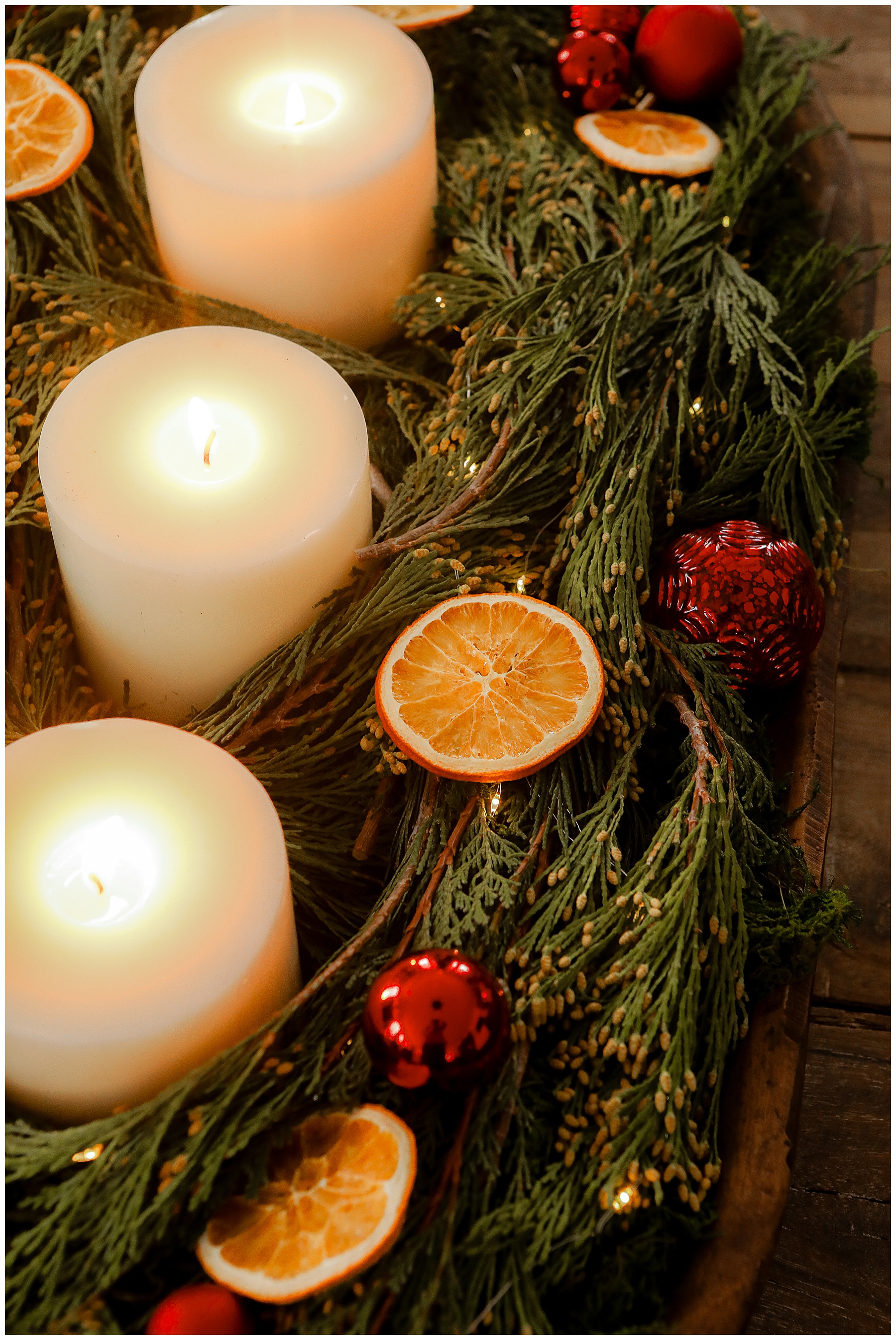 Details in the Christmas centerpiece, dried oranges, ornaments and lights - Sugar Maple Farmhouse