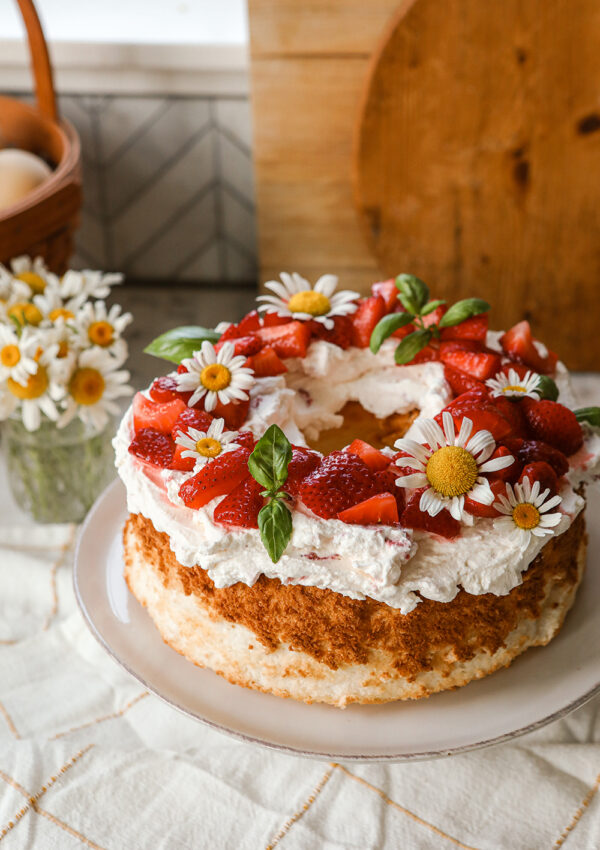 Homemade Angel Food Cake with whipped cream & strawberries